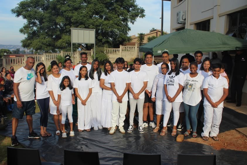 Baptism candidates gathered together in white