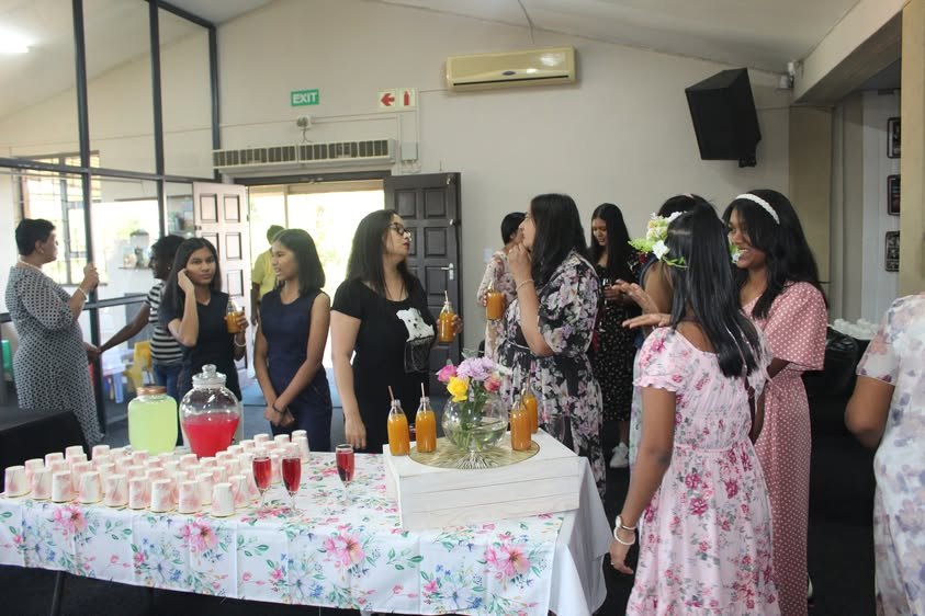Ladies gathering at the refreshment table